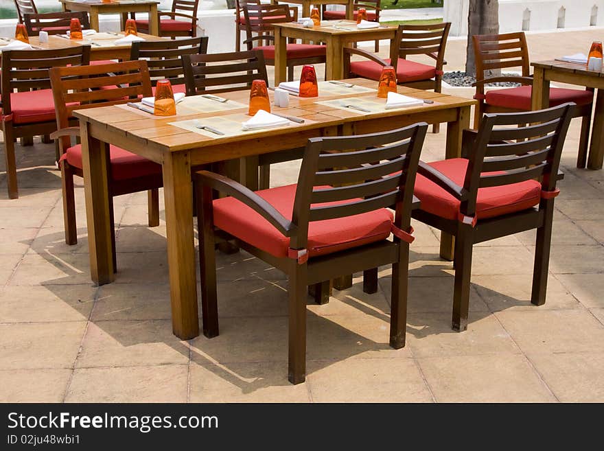 Table and chairs on beach