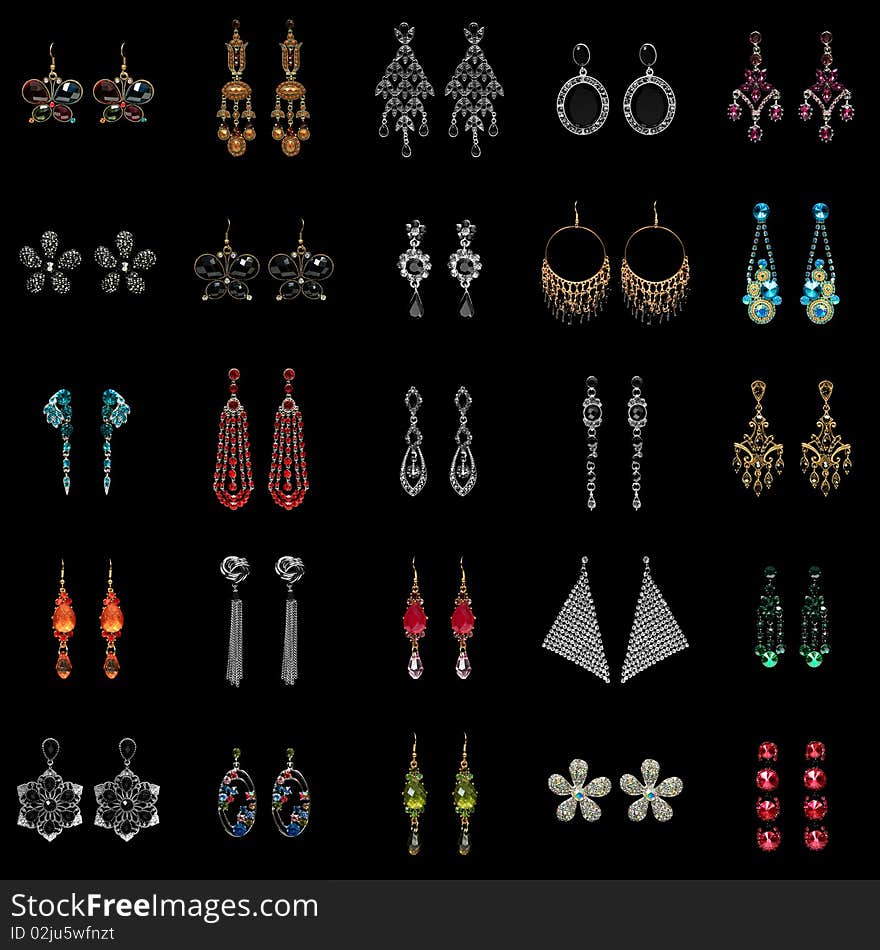 Collection Of Earrings On Black Background