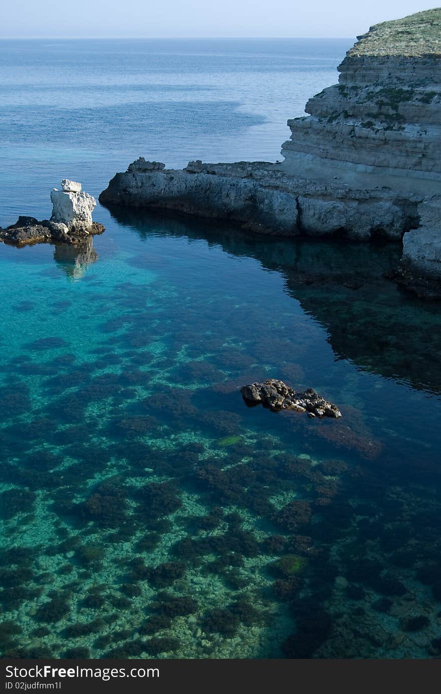 Bay with rocks and clear water. Western Crimea. Bay with rocks and clear water. Western Crimea