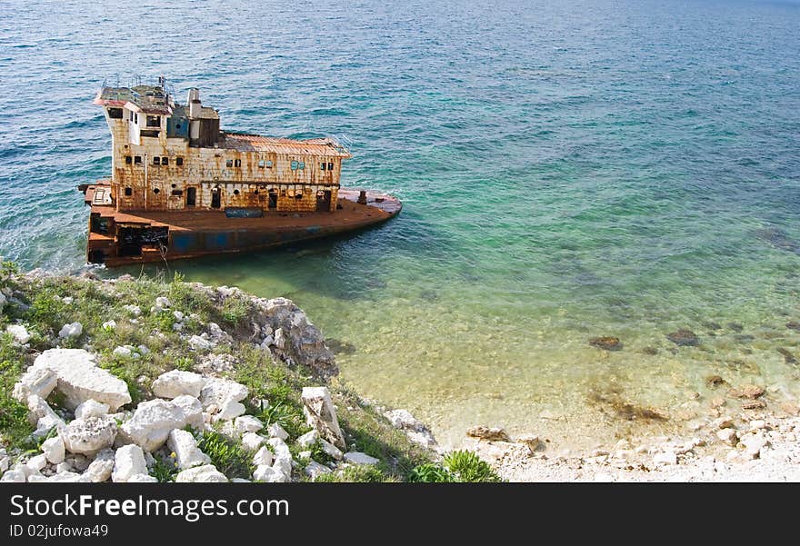 Old rusty wrecked ship in the Black sea