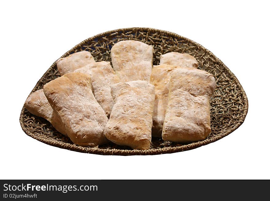 A Wicker Basket Containing a Display of Floured Bread. A Wicker Basket Containing a Display of Floured Bread.