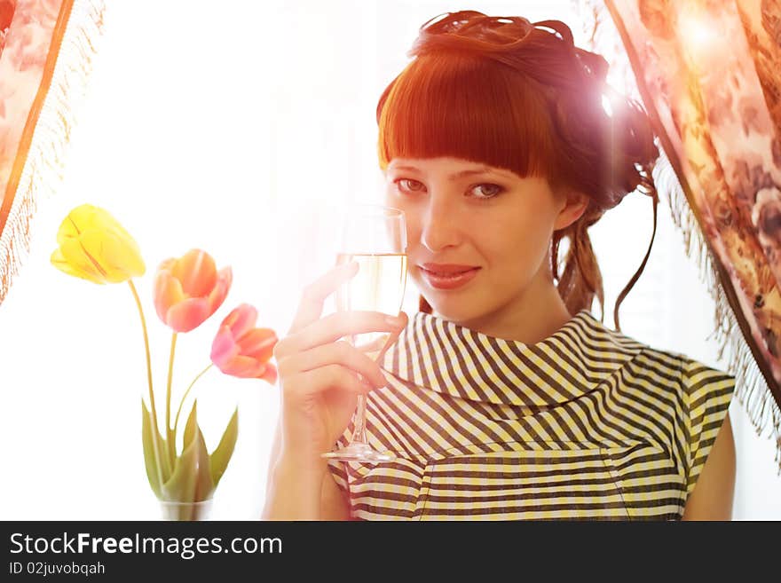 Attractive girl with a glass champagne