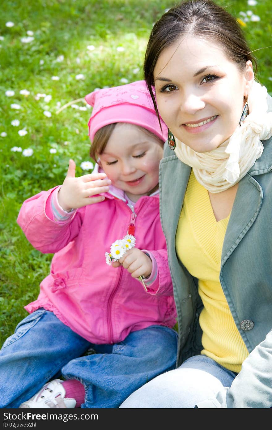 Sweet happy little girl in park