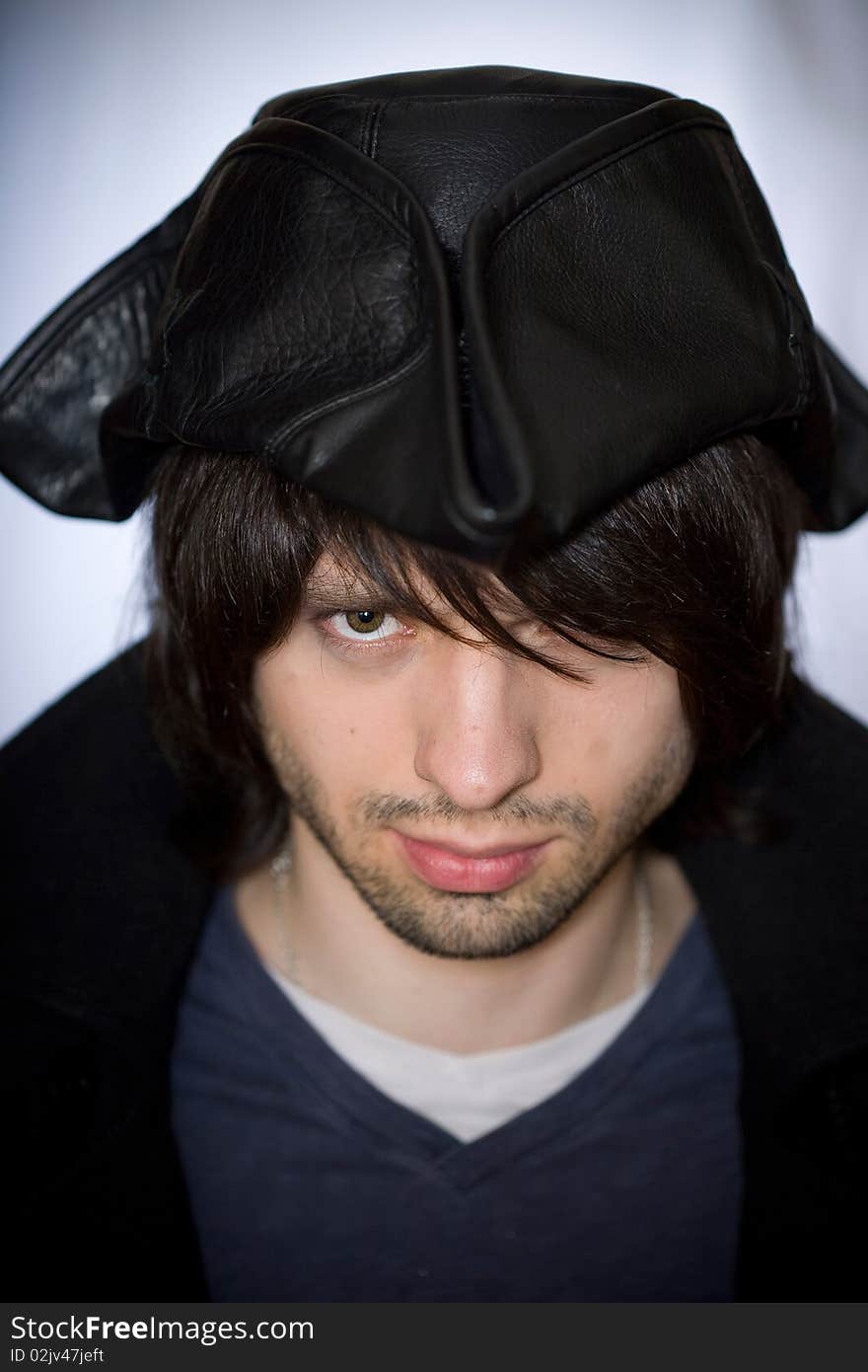 Young man with a beard in the pirate tricorn hat