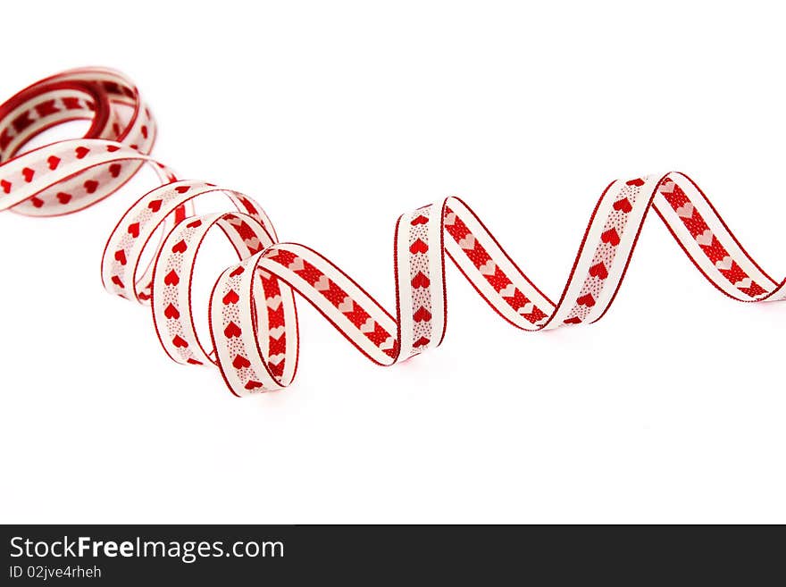 Ribbon with red hearts isolated on a white background