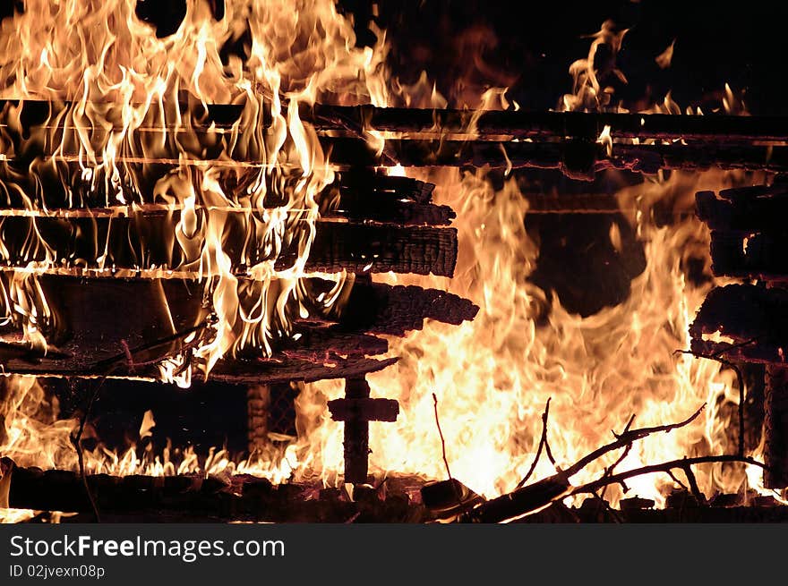 Uncontrolled fire against the dark background