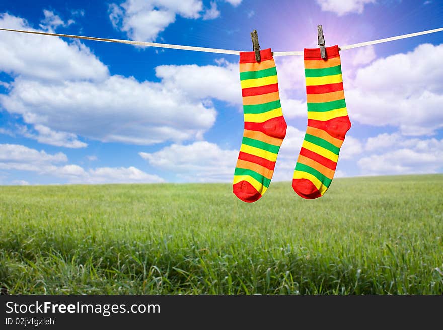 Rainbow socks hanging on a rope. Rainbow socks hanging on a rope