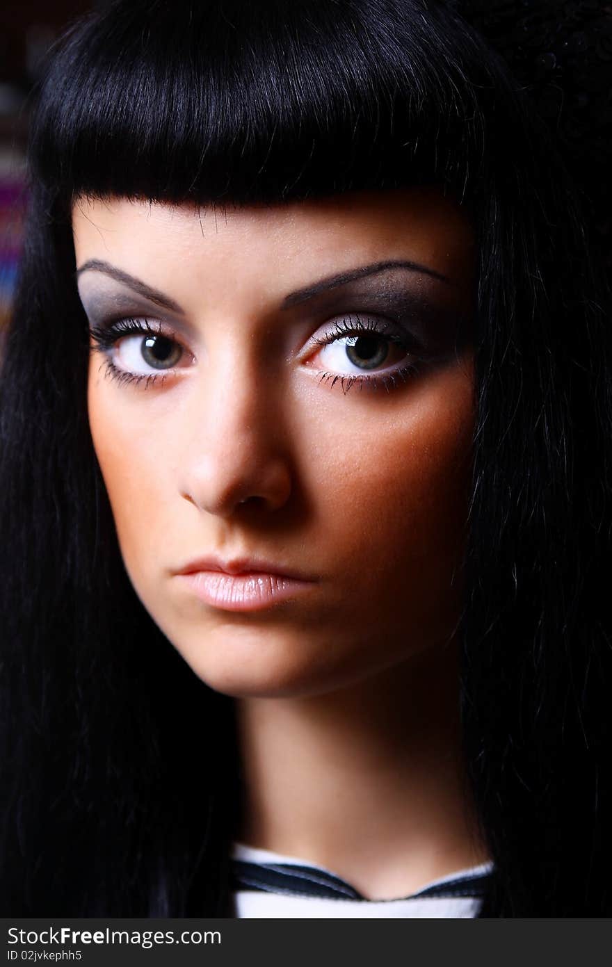 Close-up portrait of young woman with black hair. Close-up portrait of young woman with black hair