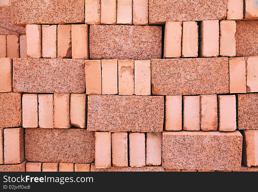 A stack of new red bricks. A stack of new red bricks