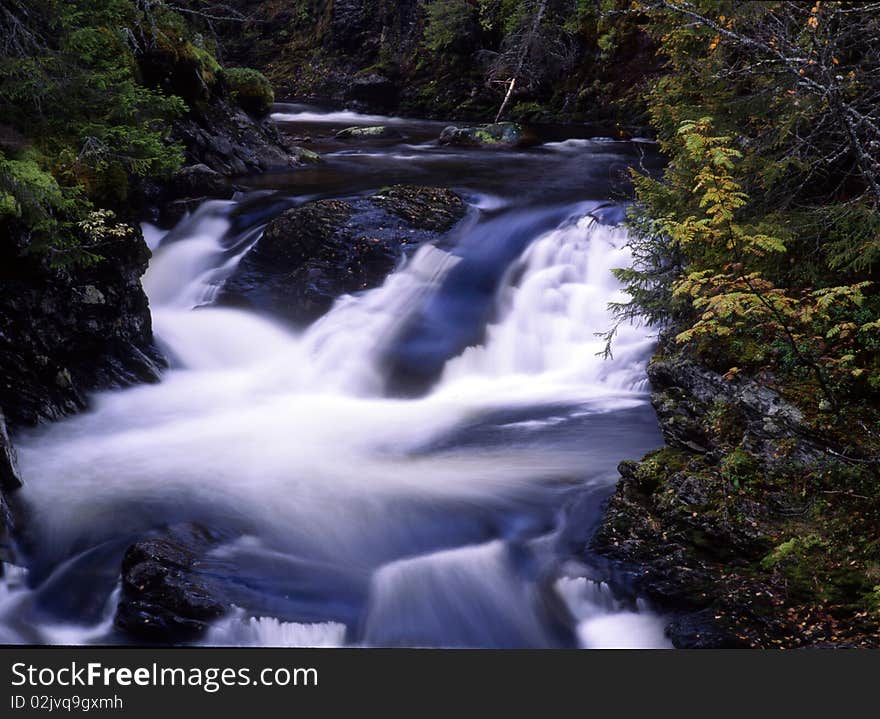 Flowing water of beautiful mountain stream