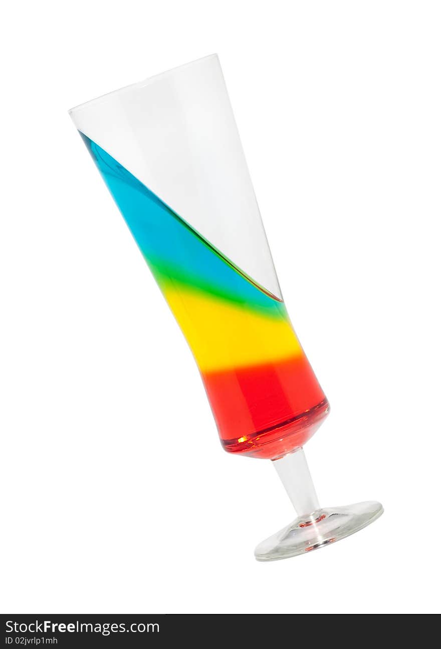 Glass with multy layered (sliced) coctail falling. Glass with multy layered (sliced) coctail falling