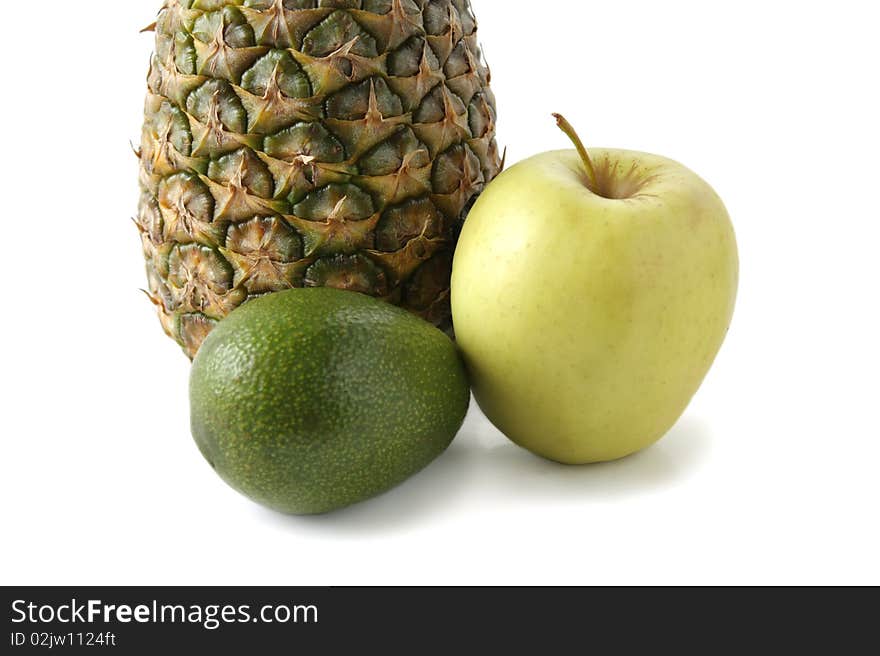 Apple pineapple and avocado on a white background. Apple pineapple and avocado on a white background