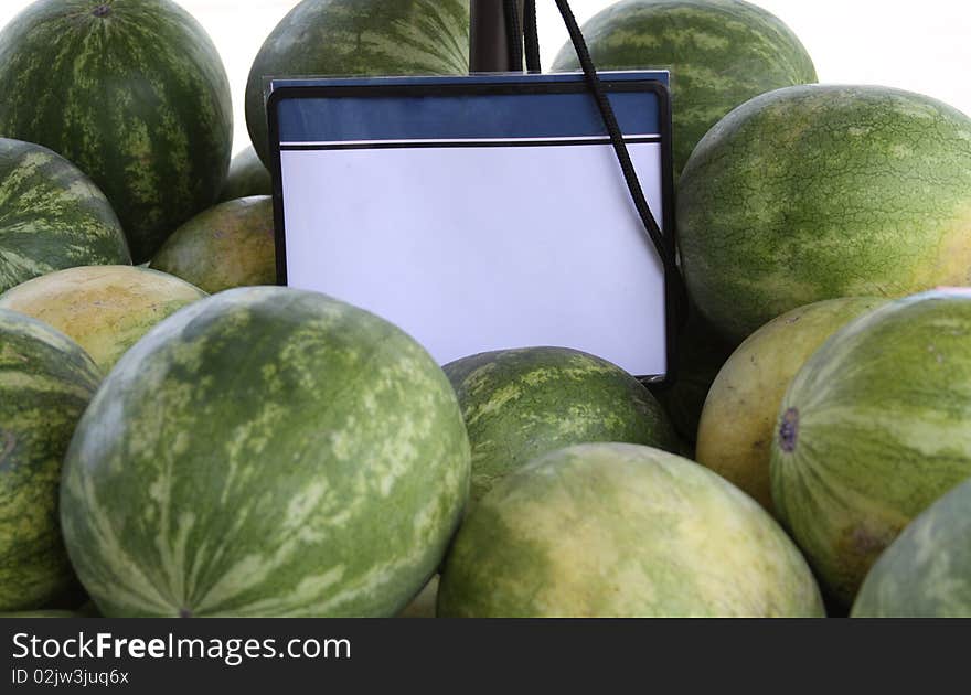 Blank sign for text in watermelon stand. Blank sign for text in watermelon stand.