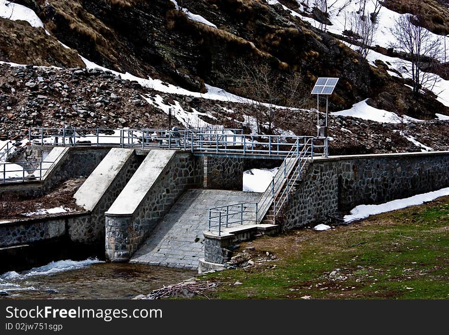 Dam with solar panel in Parco del Gran Paradiso, Italy. Dam with solar panel in Parco del Gran Paradiso, Italy