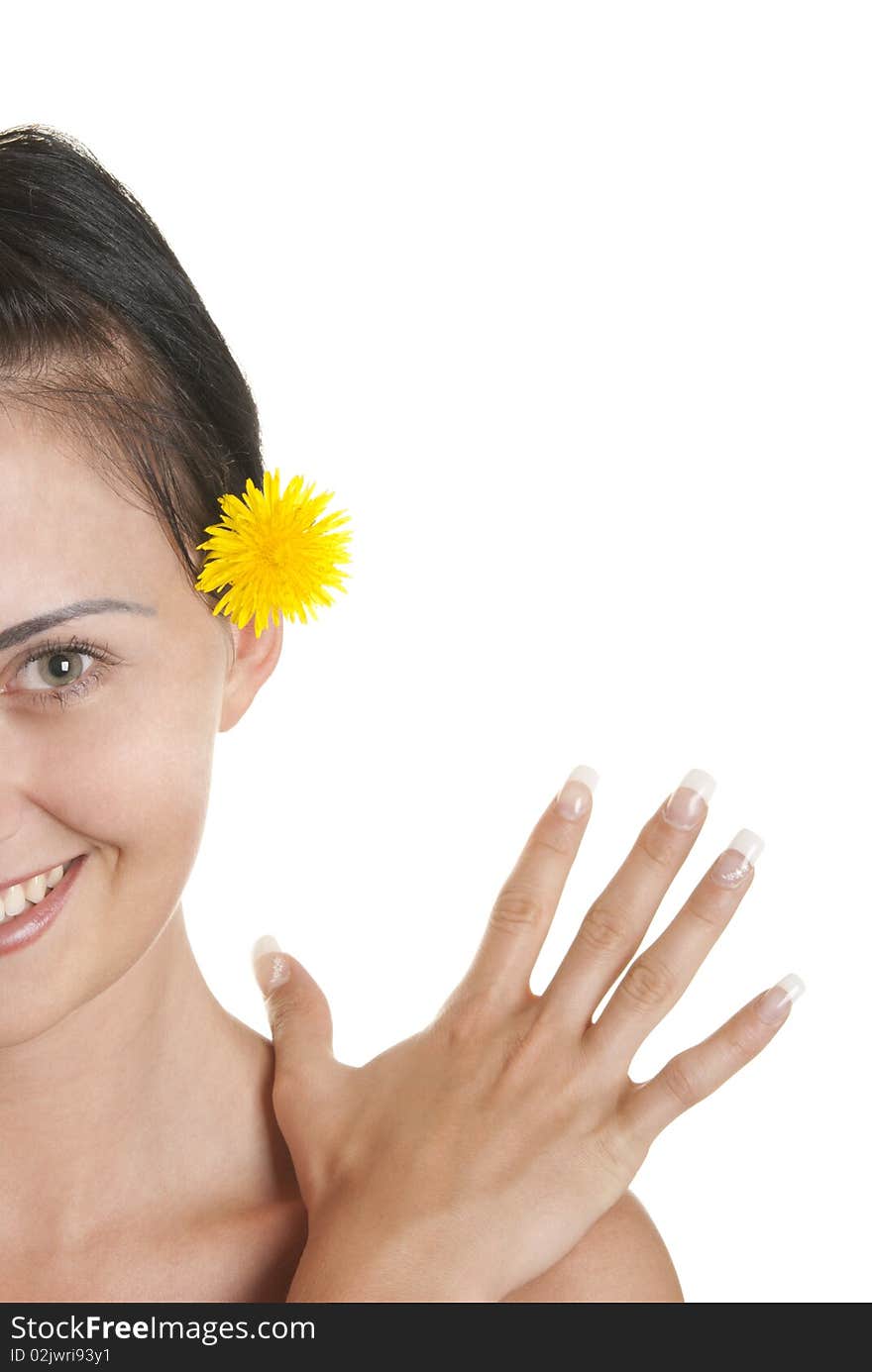 Young woman with yellow flower isolated in white