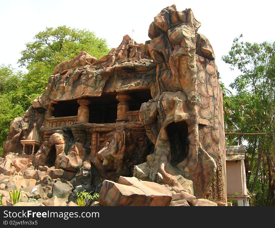 A beautiful and ancient cave with small Indian temple. A beautiful and ancient cave with small Indian temple.