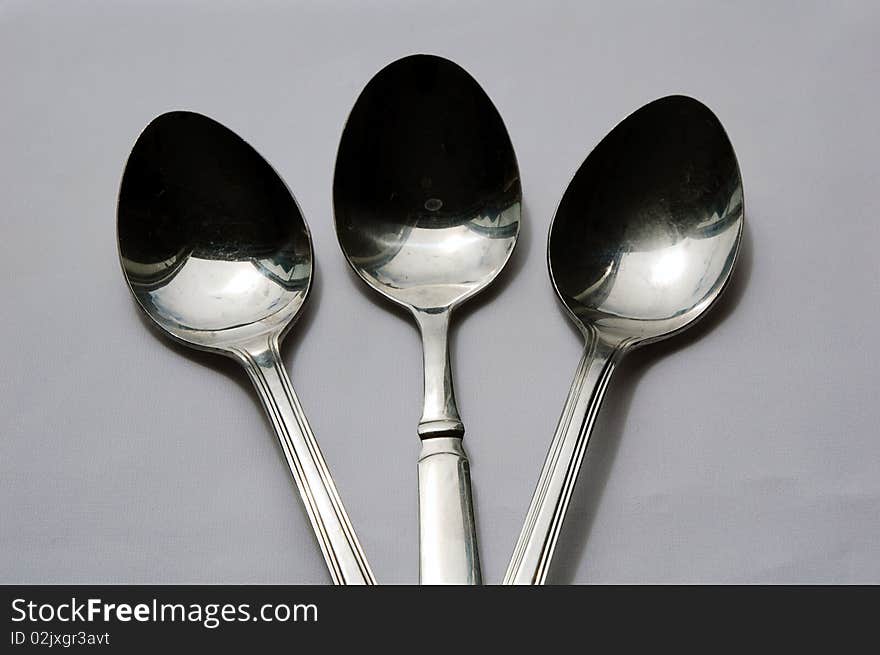 Close up of three spoon with white background