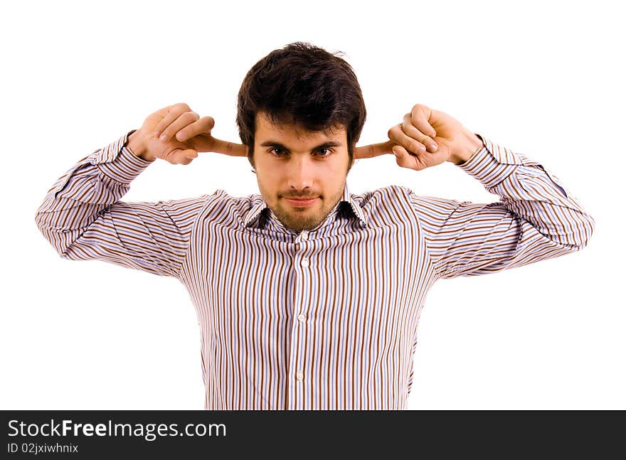 Young man with fingers in ears isolated on white