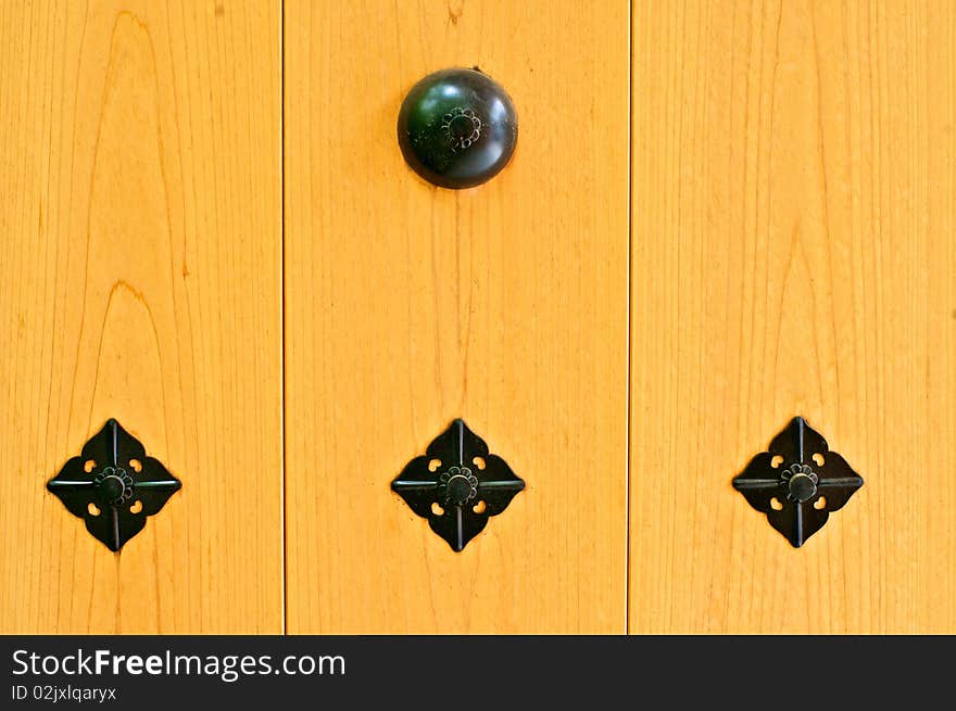 An ornamental door at a Shinto temple. An ornamental door at a Shinto temple