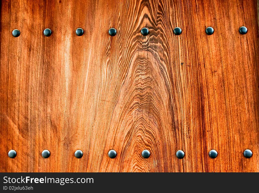 An ornamental door at a Shinto temple. An ornamental door at a Shinto temple