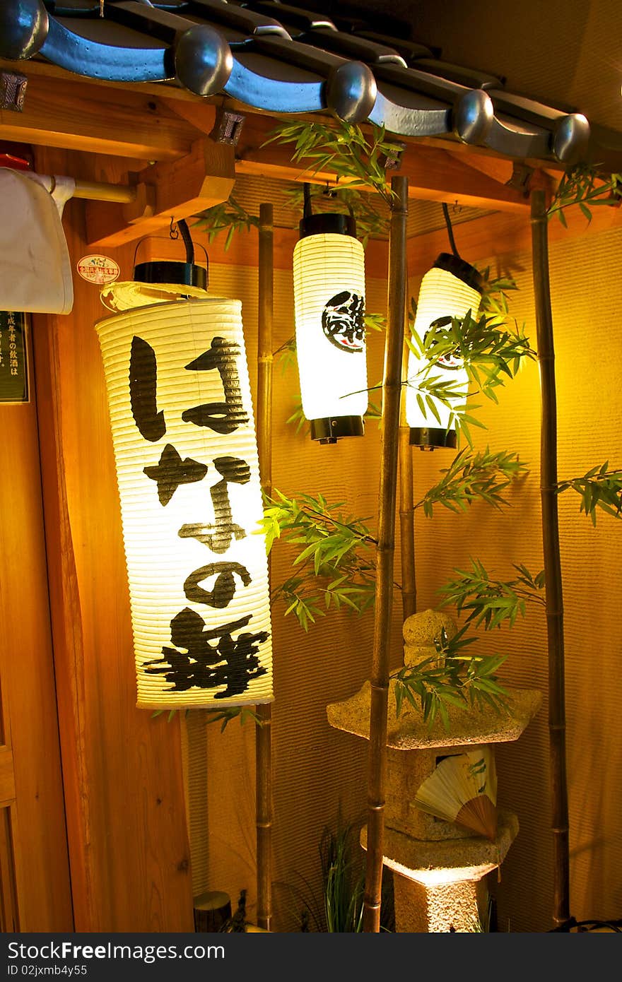 Decorative Japanese lanterns with ornamental bamboo, lanterns, and a Japanese fan