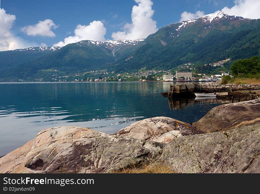 Lake in the mountain with small village