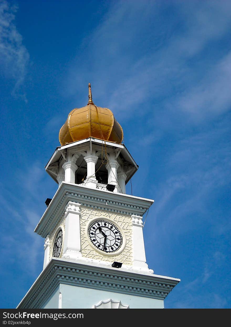 The Clock tower under blue sky