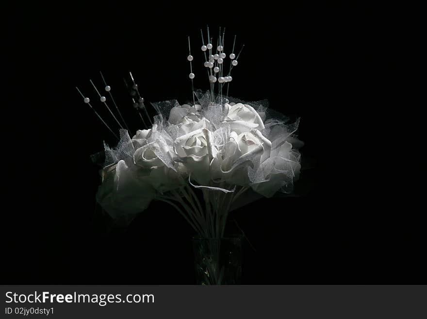 Bouquet in a vase against a dark background