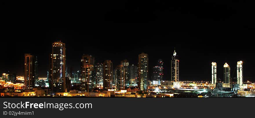 Panoramic shot of Dubai downtown at night. Panoramic shot of Dubai downtown at night