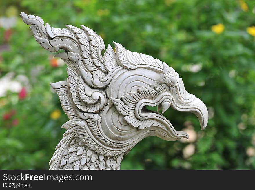 The sculpture detail of white Thai griffin head