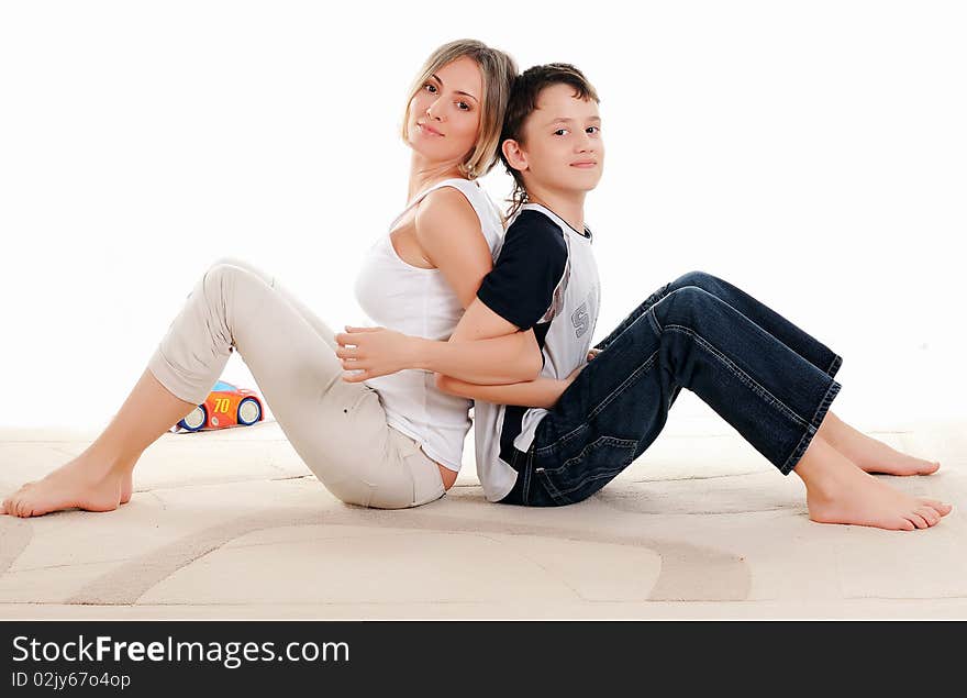 Mother and son sitting next to each other