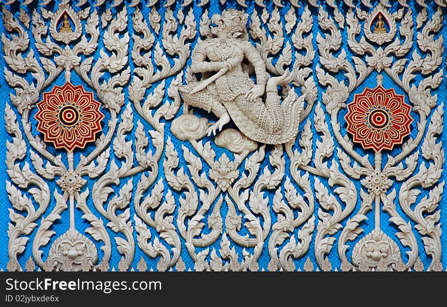 Traditional Thai Style Molding Art With Blue Glass