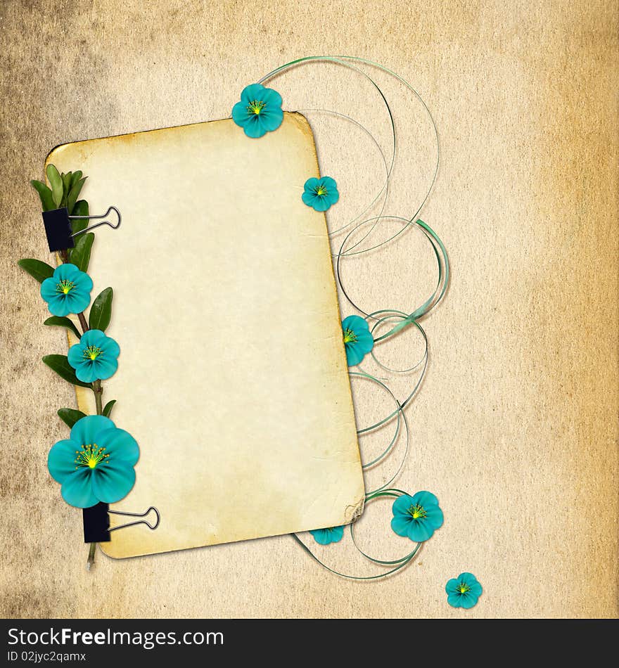 Paper with flowers on old grunge background