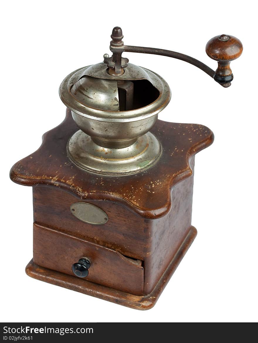 Ancient coffee grinder isolated over white background