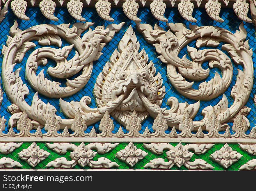 Thai style molding art with glass