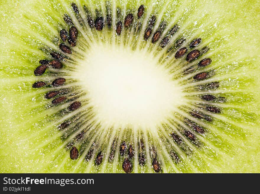 Background of the slice of fresh ripe kiwi.