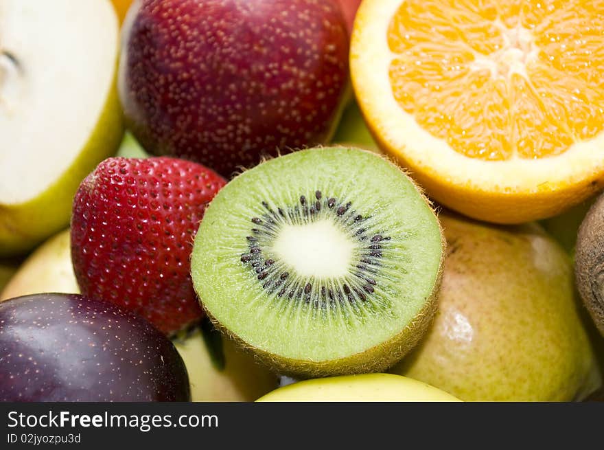 Sliced ripe kiwi and beautiful bright juicy fruit. Sliced ripe kiwi and beautiful bright juicy fruit.