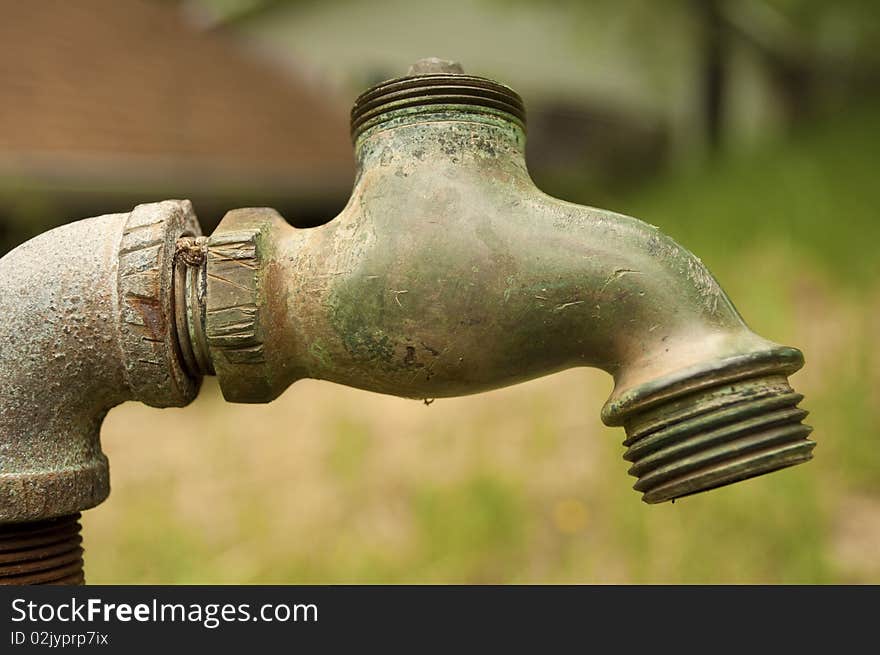 Rusty Old Pipe And Spigot