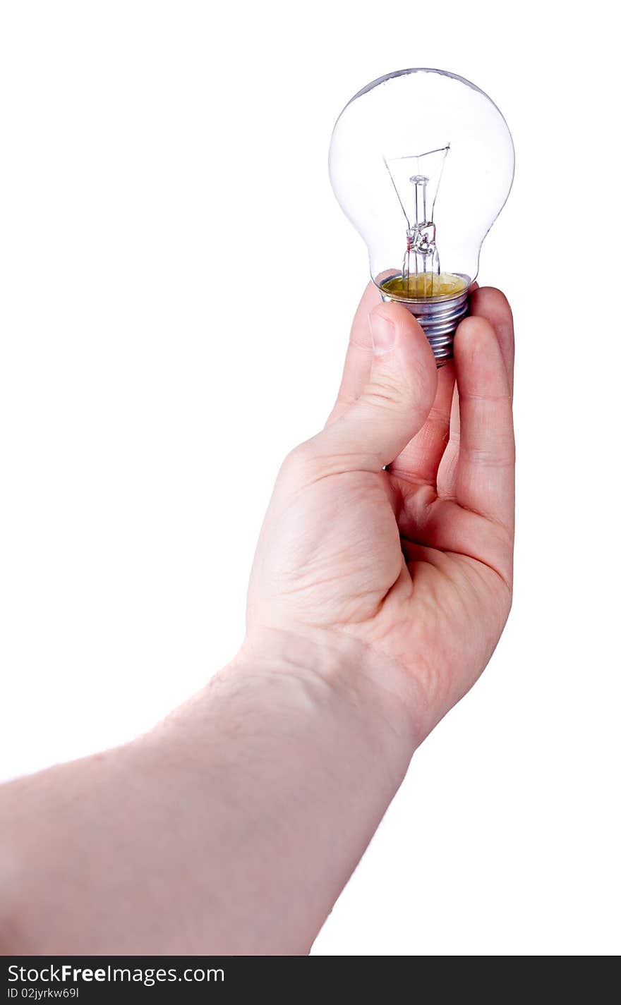 Light bulb in hand isolated on white