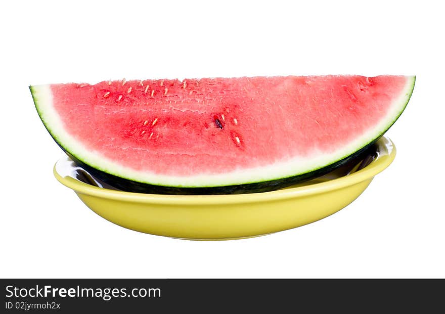 Watermelon on plate isolated on white