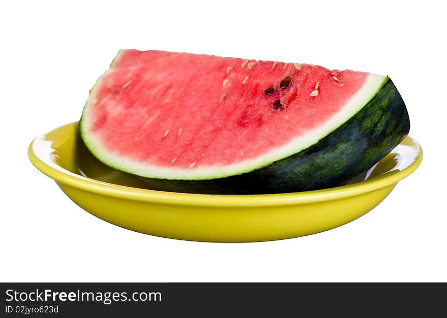 Watermelon on plate isolated on white