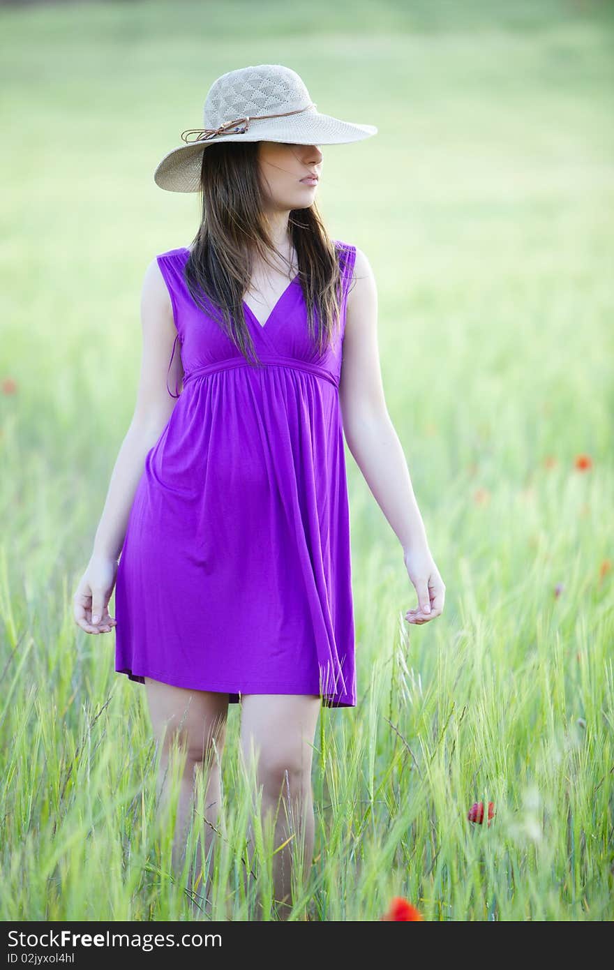 Hidding Behind Her Hat