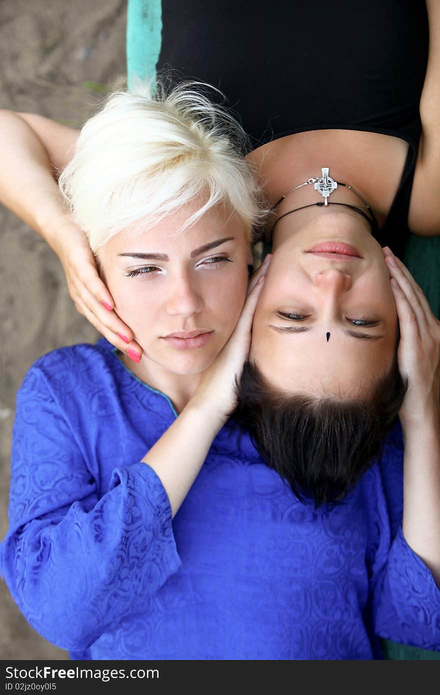 Portraits of two young women, top view. Portraits of two young women, top view