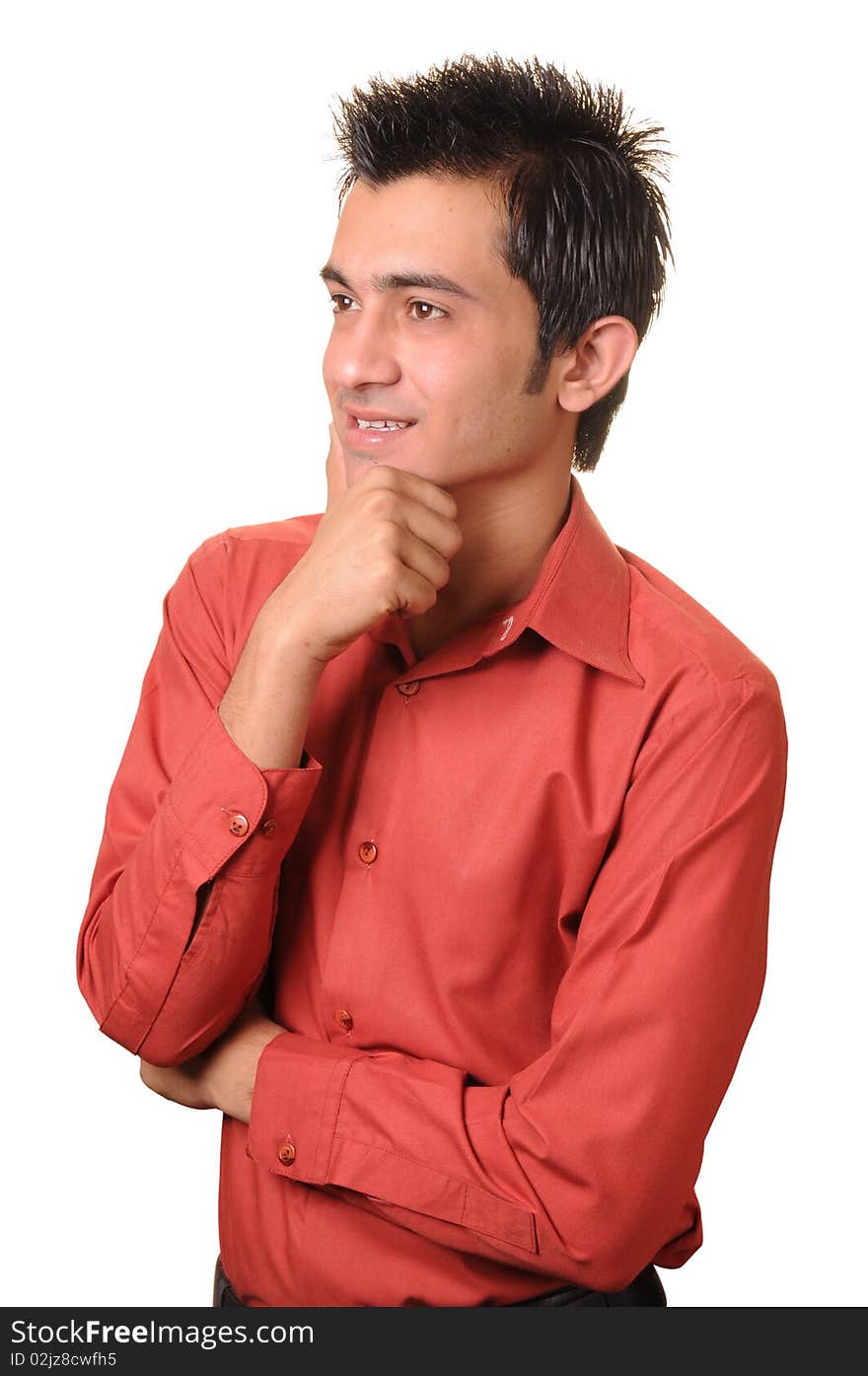 A young South Asian casual businessman looking at copy space.