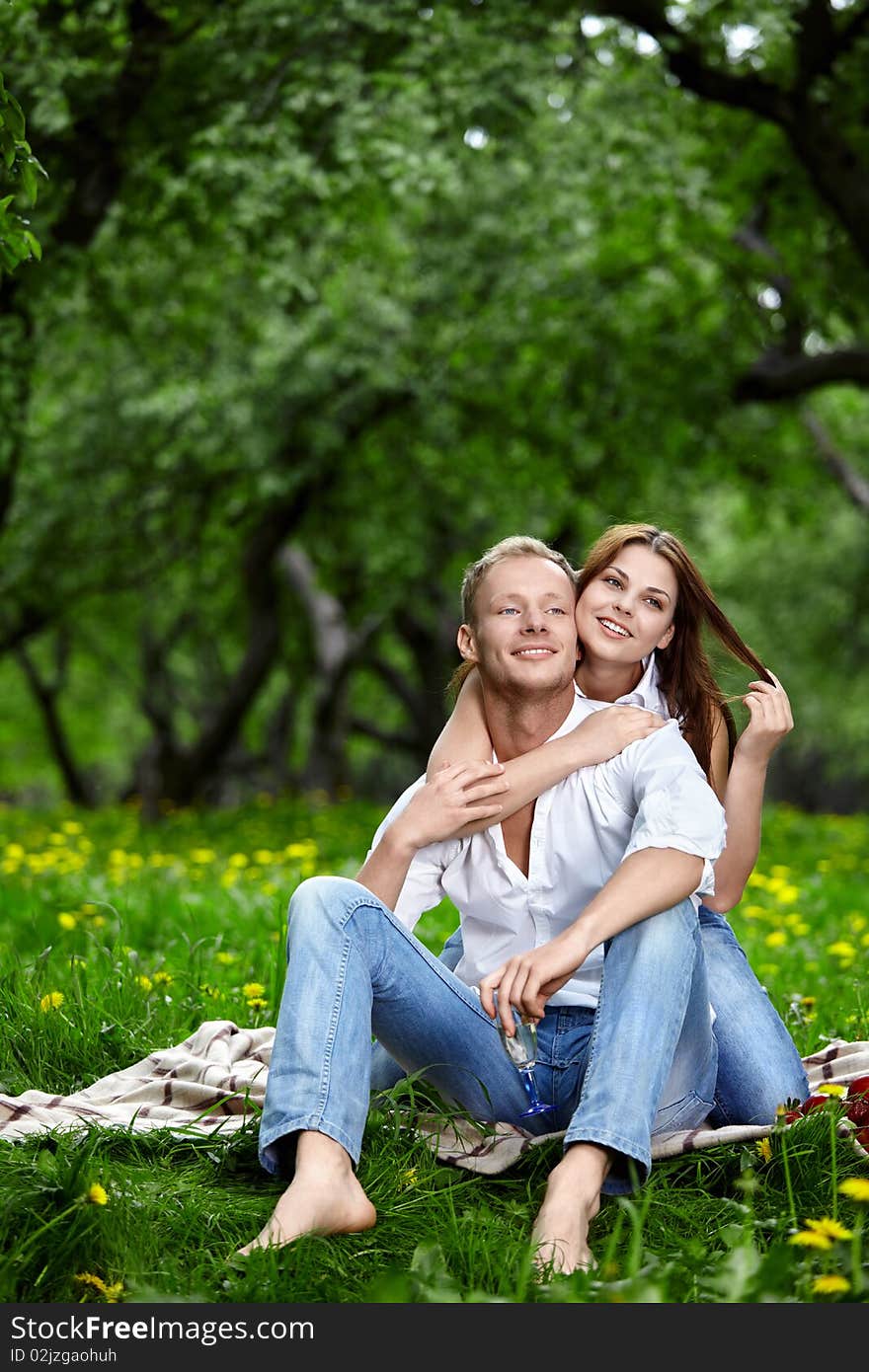 Happy enamoured couple in wood. Happy enamoured couple in wood