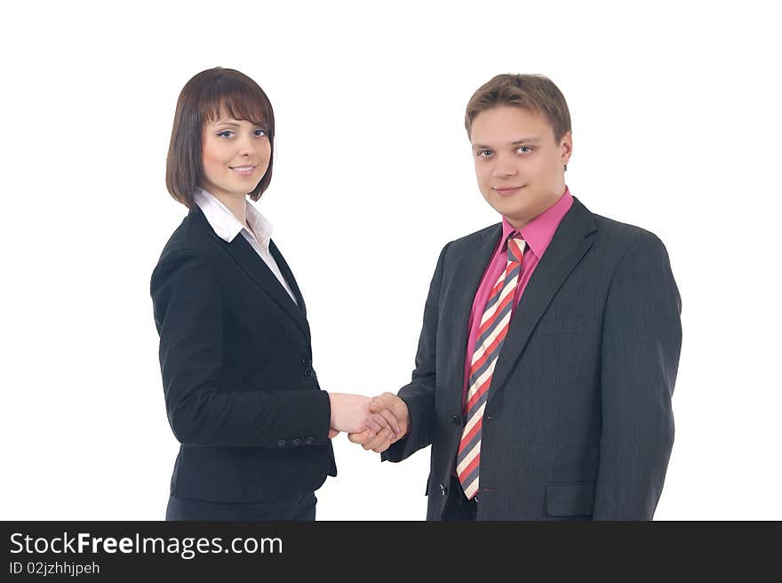 Two young business colleagues are holding their hands together. Image isolated on a white background. Two young business colleagues are holding their hands together. Image isolated on a white background.