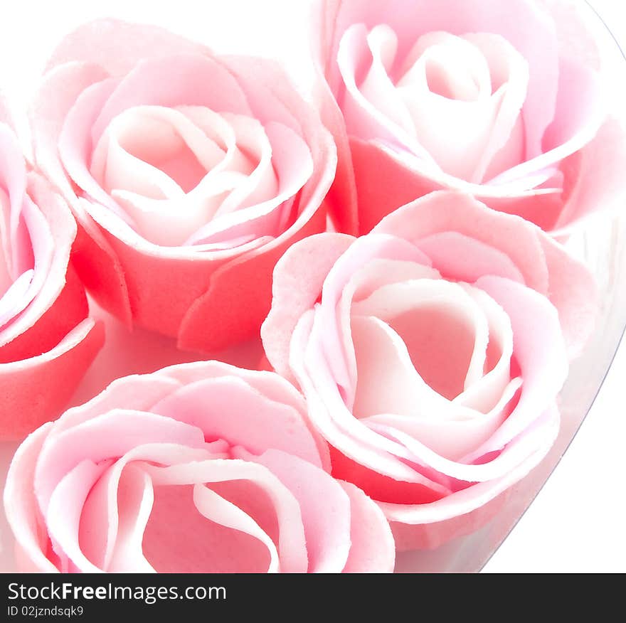 Buds of artificial pink roses close up