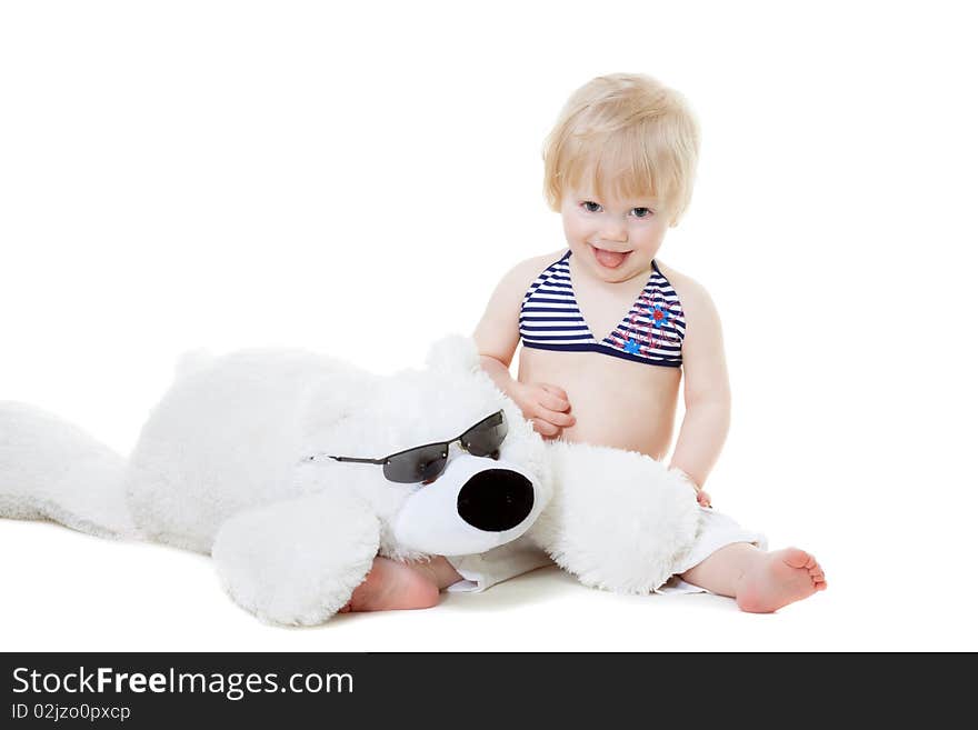 Cute baby with teddy bear getting ready for beach season isolated on white