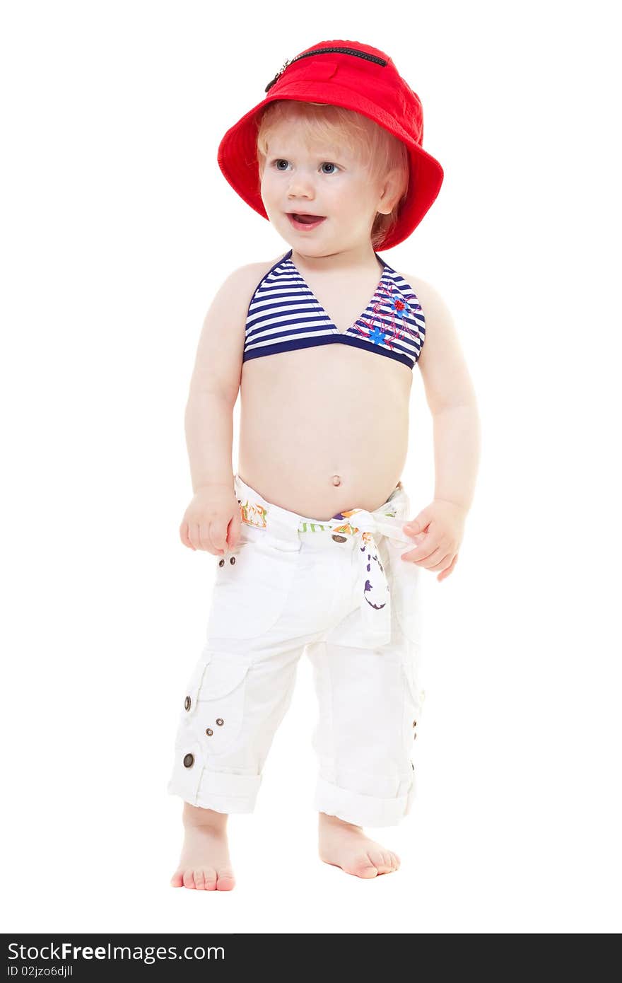 Baby girl in a swimsuit and red hat isolated on white