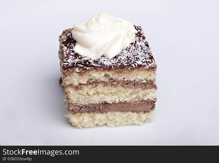 Delicious cake with whipped cream